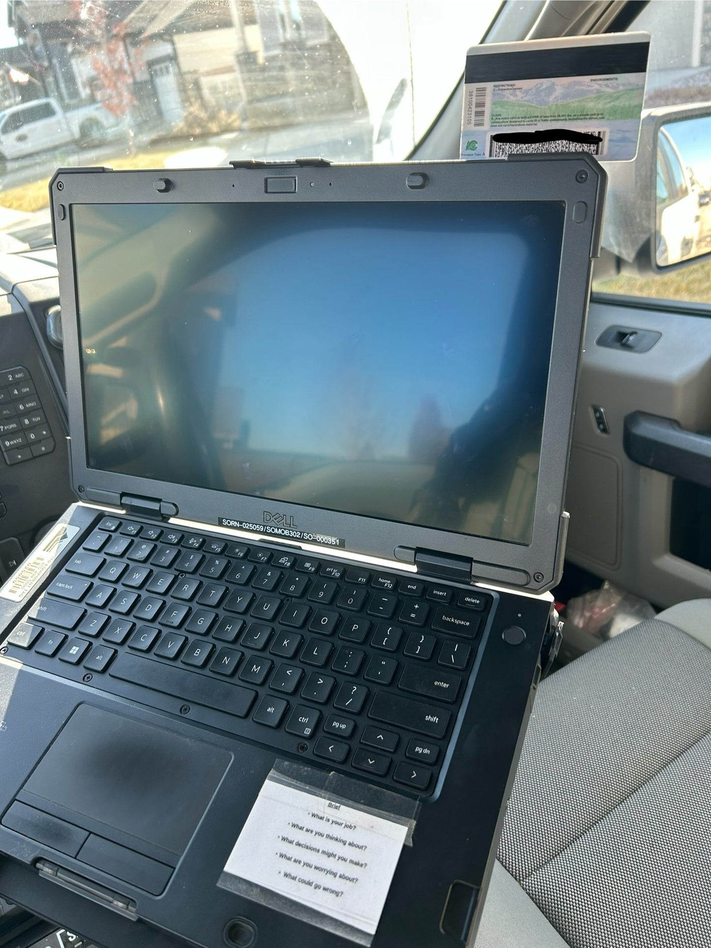 ID Card secured in patrol car for police officers