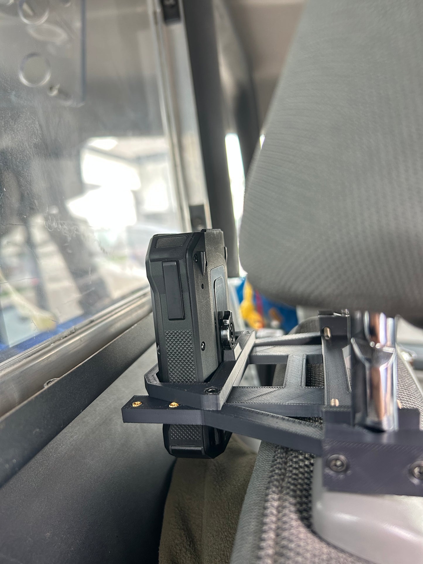 Axon Body Camera held in Body Camera Vehicle Mount, gear for police