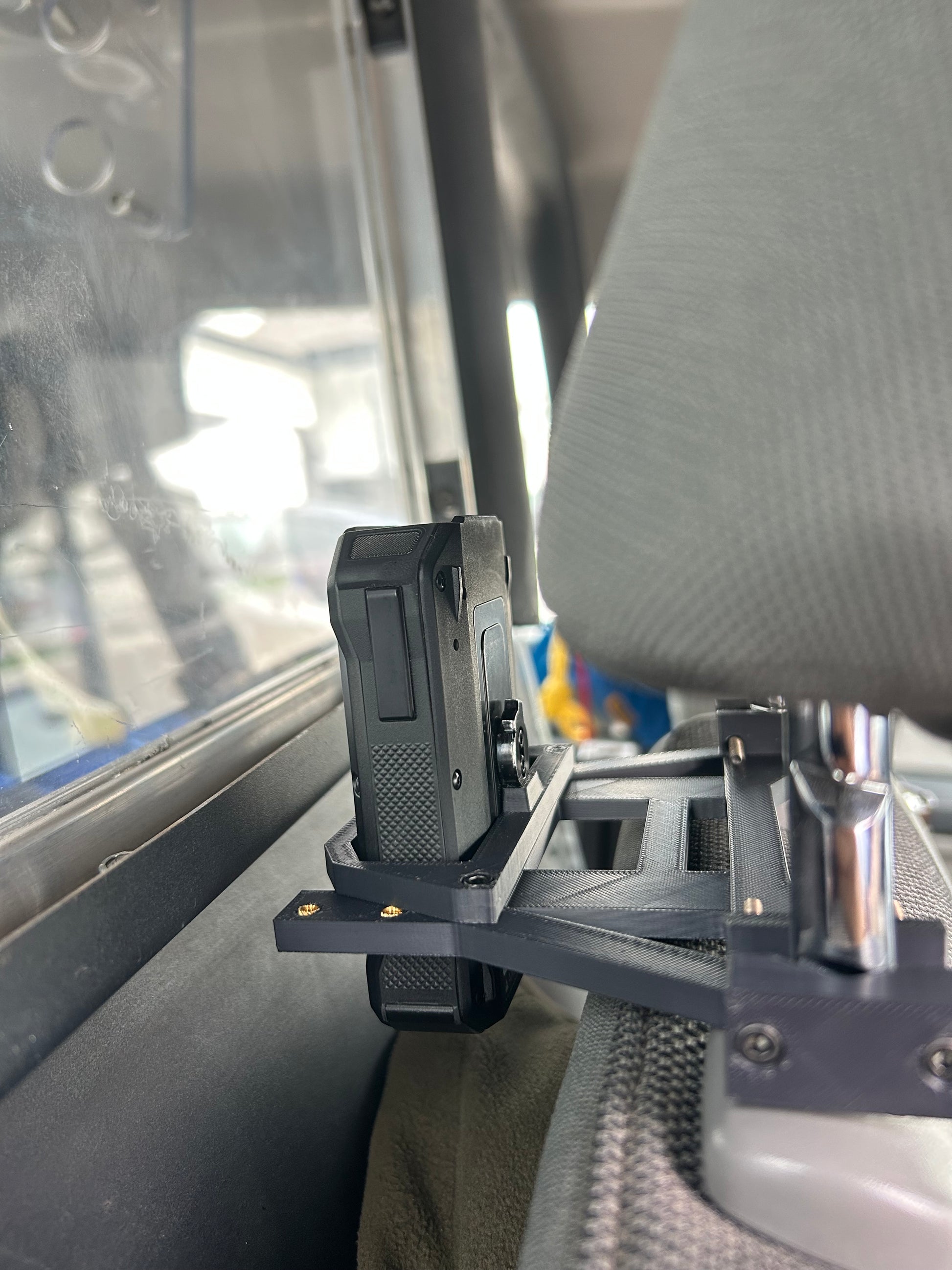 Axon Body Camera held in Body Camera Vehicle Mount, gear for police