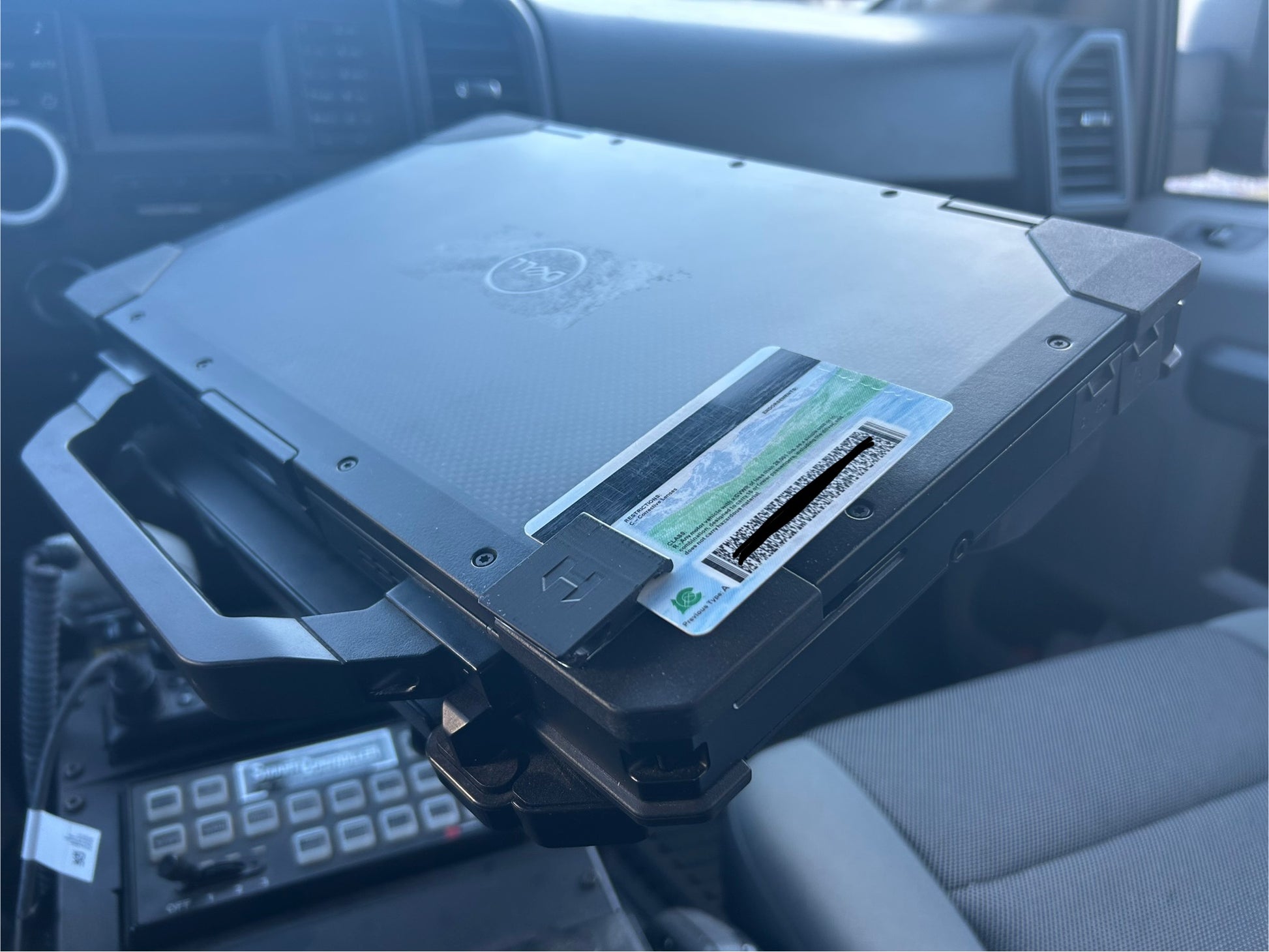 ID Card holder mounted on computer for law enforcement officers