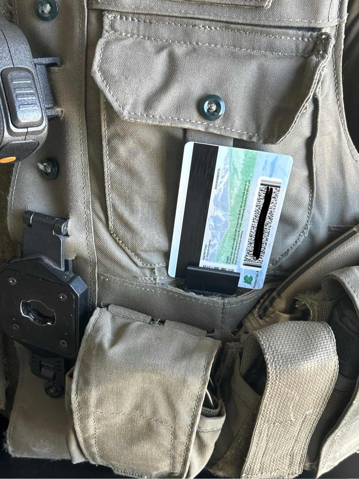 ID Card secured on tactical vest for patrol officers