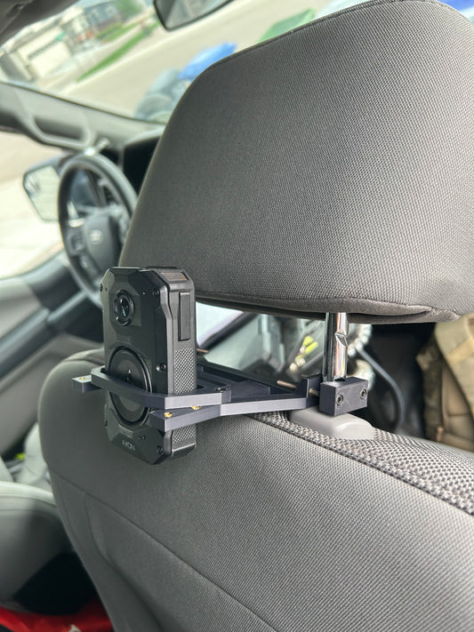 Axon Body Camera being held in Body Camera Vehicle Mount